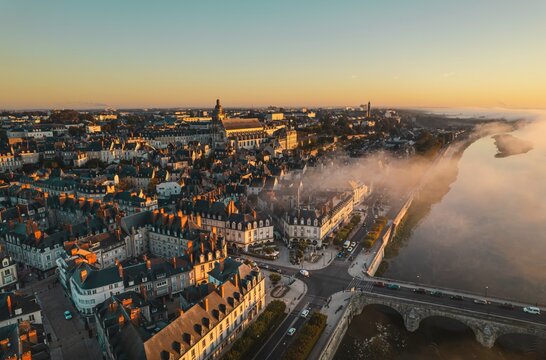 Bridging Vibrance: An Aerial Symphony Capturing Blois Charming Cityscape and Majestic Bridge