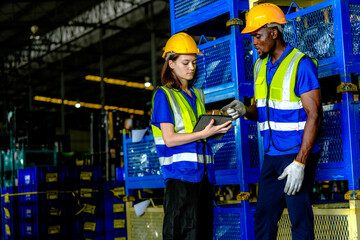 Concept workers people operation in industrial. team of factory industrial warehouse. Male giving some advice to team. Group of Diversity engineer factory people meeting.