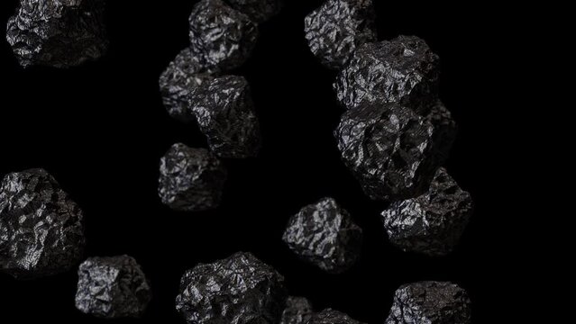 Realistic looping 3D animation of the anthracite coal chunks falling from the top rendered in UHD with alpha matte