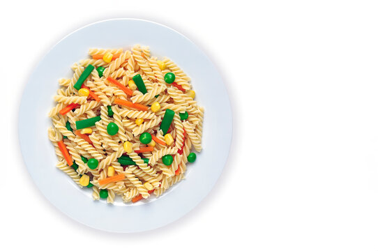 Still Life With Pasta Dish With Peas, Green Beans And Carrots, On White Background.