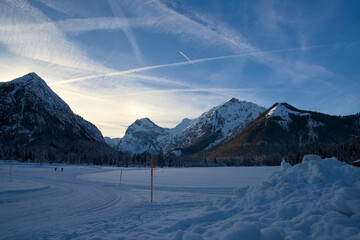 Snow-covered winter landscape with mountains in Pertisau at Lake Achensee
