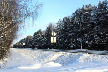 Winter highway in frosty sunny weather.