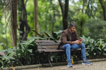 Fototapeta premium View of a young man with smartphone