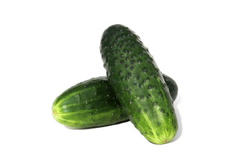 A bunch of sliced cucumbers in circles lie in one pile.	