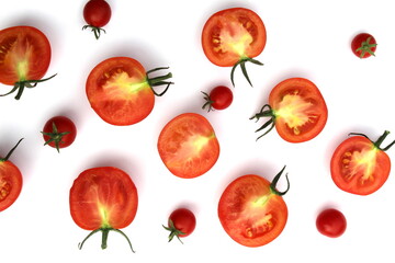 Tomatoes cut in half lie on a white background.
