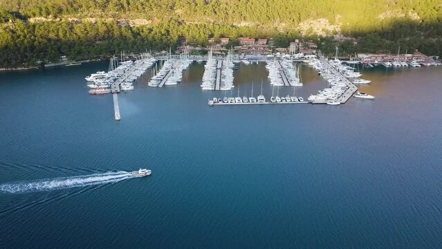 Sailing into Serenity: Drone Video of Boat Entering Orhaniye Marina, Marmaris, Turkey