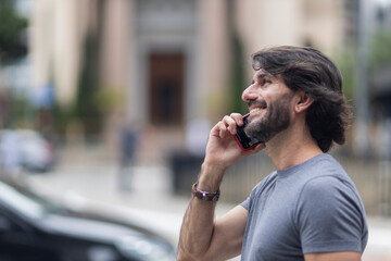 Fototapeta premium View of a young man with smartphone