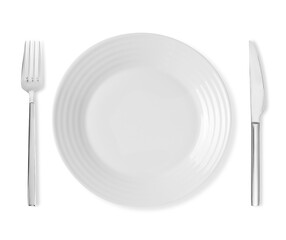 Clean plate, fork and knife on white background, top view