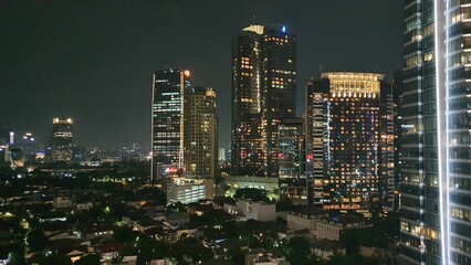 Fototapeta na wymiar Jakarta, Indonesia – January 31, 2024: A night cityscape view of Indonesia capital city Jakarta