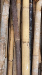 Close up background of dry thick yellow bamboo at Jakarta, Indonesia
