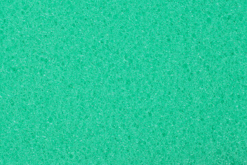 Green texture cellulose foam sponge. Background