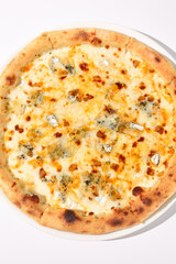 Top View of Italian Quattro Formaggi Pizza with Four Cheeses on White