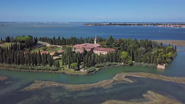 Aerial view of San Francesco del Deserto island and Franciscan monastery in Venetian Lagoon, Italy