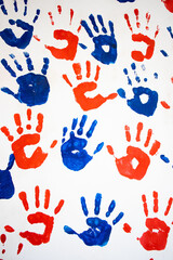 children's handprints in blue and red colors on white background