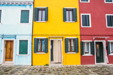 Murano and Burano island landscape. Venice region in Italy. Colorful various home facades.