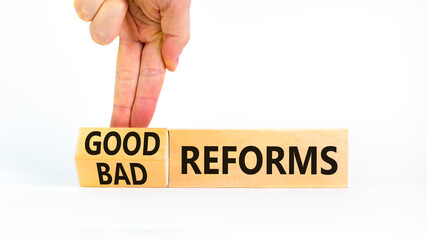 Good or bad reforms symbol. Concept words Good reforms Bad reforms on beautiful wooden blocks....