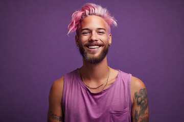 Portrait of a smiling young man with pink hair on a purple background