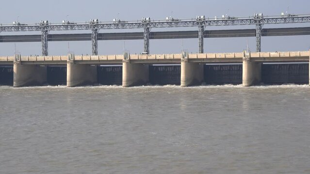 Aerial view of Head Taunsa Barrage is a barrage on the Indus River in Tehsil Taunsa, Dera Ghazi Khan District, Punjab Province, Pakistan. Where a lot of water is stored. Beautiful drone 4K view.