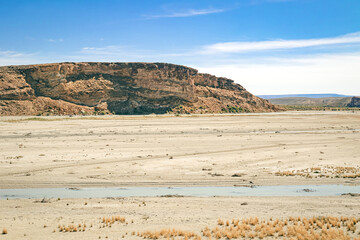 Desert landscape and shallow river in southeast Wyoming, USA 