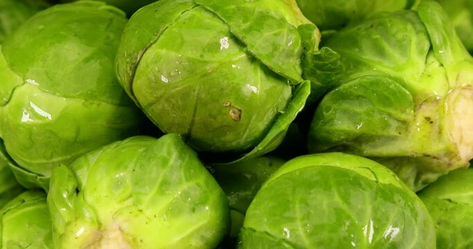 Video of fresh green brussels sprouts in extreme close up. High amounts of vitamins and minerals make Brussels sprouts healthy