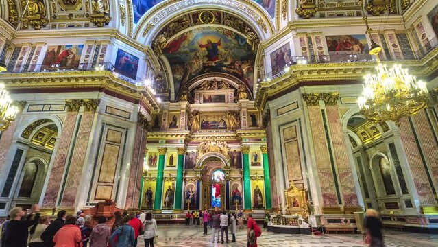 SAINT-PETERSBURG, RUSSIA - JUNE, 2023: Timelapse view of Saint Isaac's Cathedral interior, ancient frescoes on the walls. Historical famous city touristic landmark from within.