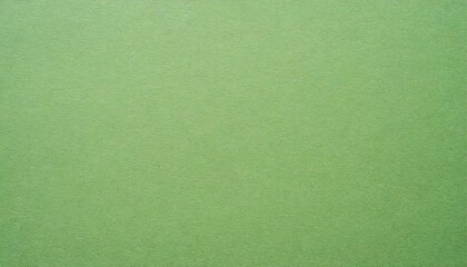 green pastel color paper texture background or cardboard surface from a paper box for packing and...