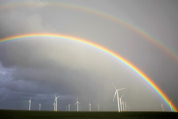 Rainbow above a offshore windpark, Breezanddijk, Holland