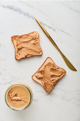 peanut butter sandwich on marble table