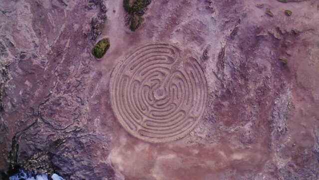 Aerial Top Ascending View Of Kapalua Labyrinth With Tourists By Sea At Sunset - Maui , Hawaii