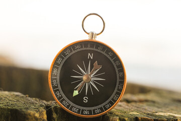 round compass on natural background - 737492392