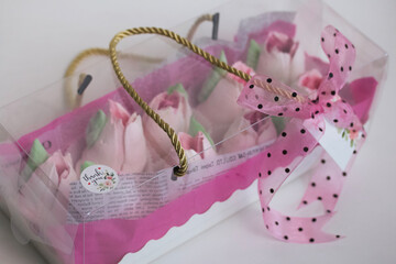 Homemade zephyr. Zephyr flowers. Gift box with pink tulips. Tulips from marshmallows. Close-up