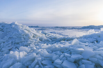 Landscape with broken ice shards lay on the coast of Baltic Sea © evannovostro