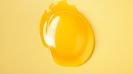 Artificial egg yolk isolated on yellow background - obrazy, fototapety, plakaty