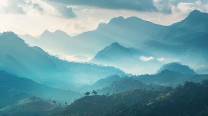 An awe-inspiring morning view of mountains shrouded in mist, showcasing the breathtaking natural scenery