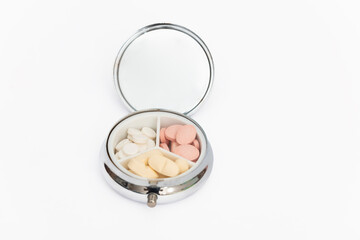 Pill box daily take a medicine on white background