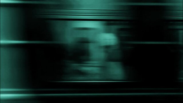 Blurred in motion passenger train moves at high speed. Visual effect.