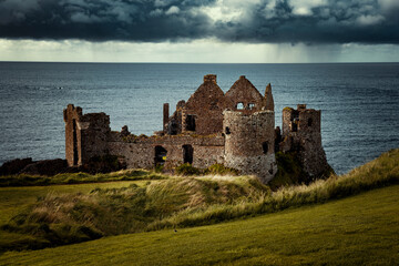 Dunluce Castle, ruined medieval castle in Northern Ireland,  a symbol of Irish Heritage and Culture