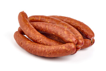 Long thin smoked sausages, isolated on white background