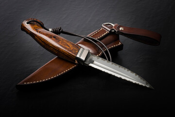 Hunting knife handmade on a black background.
- 737537970