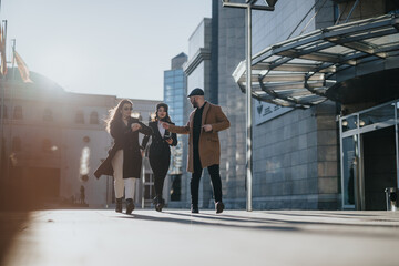 Urban business teammates in casual business meeting outdoors, dynamic teamwork on the go.