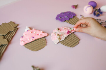 A child sculpts from plasticine, an idea for an activity