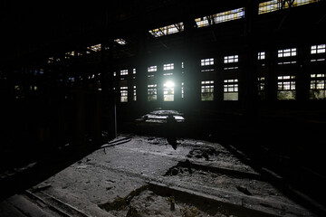 Dark and creepy abandoned industrial building at night