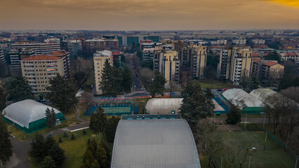 Cityscape top view. Italian city view from a drone Sunset in cloudy weather, view from a drone of...