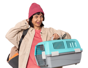 Young Hispanic woman ready for travel with pet carrier feels proud and self confident, example to follow.