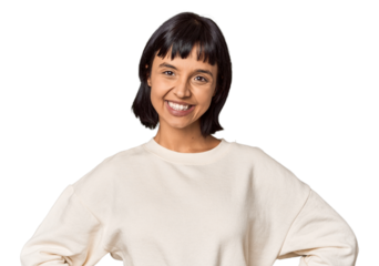 Young Hispanic woman with short black hair in studio confident keeping hands on hips.