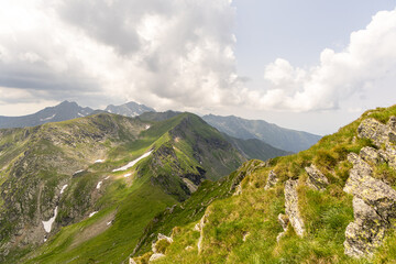 Hiking trail near the mountains. Summer outdoor activities.