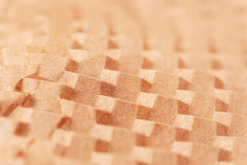 Sliced brown paper for packaging. Using recyclable materials concept. Closeup, macro