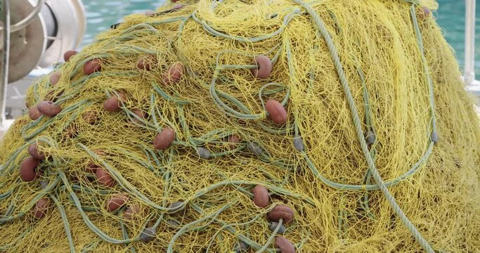 Closeup of fishing net detail on fisherman boat