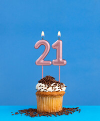 Candle number 21 - Birthday card with cupcake on blue background