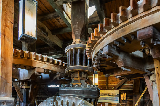 Interior of traditional Dutch old wooden windmill in Zaanse Schans - museum village in Zaandam. ZAANDAM, The NETHERLANDS. February 9, 2024.